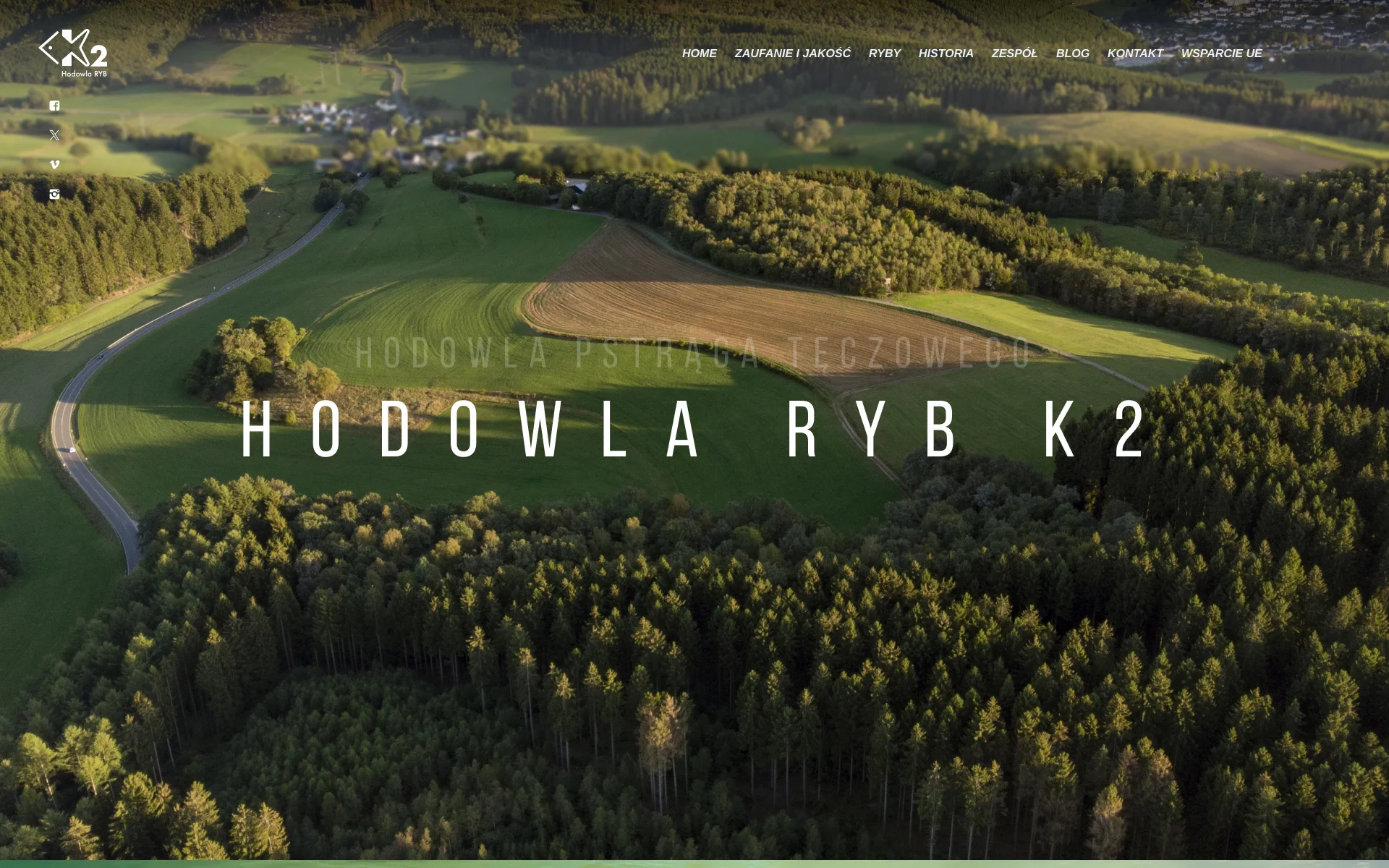 Strona główna hodowlak2.pl – hero z zdjęciem hodowli z drona